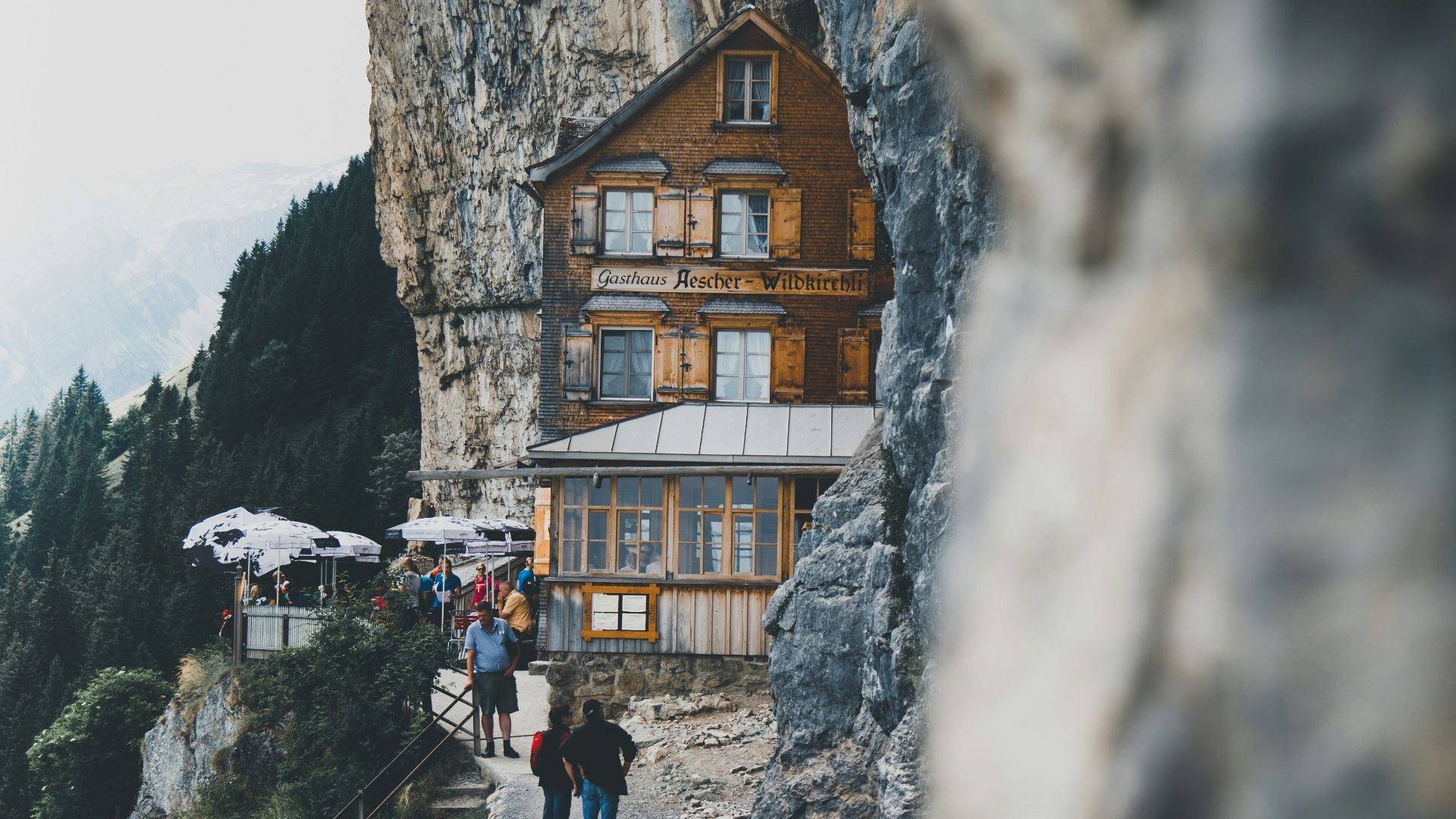 two men looking at the house