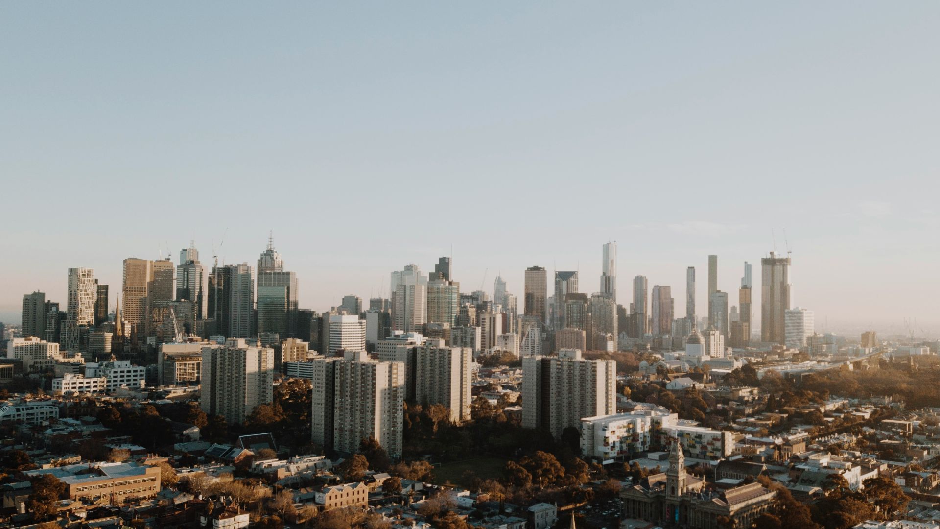 city skyline under blue sky during daytime