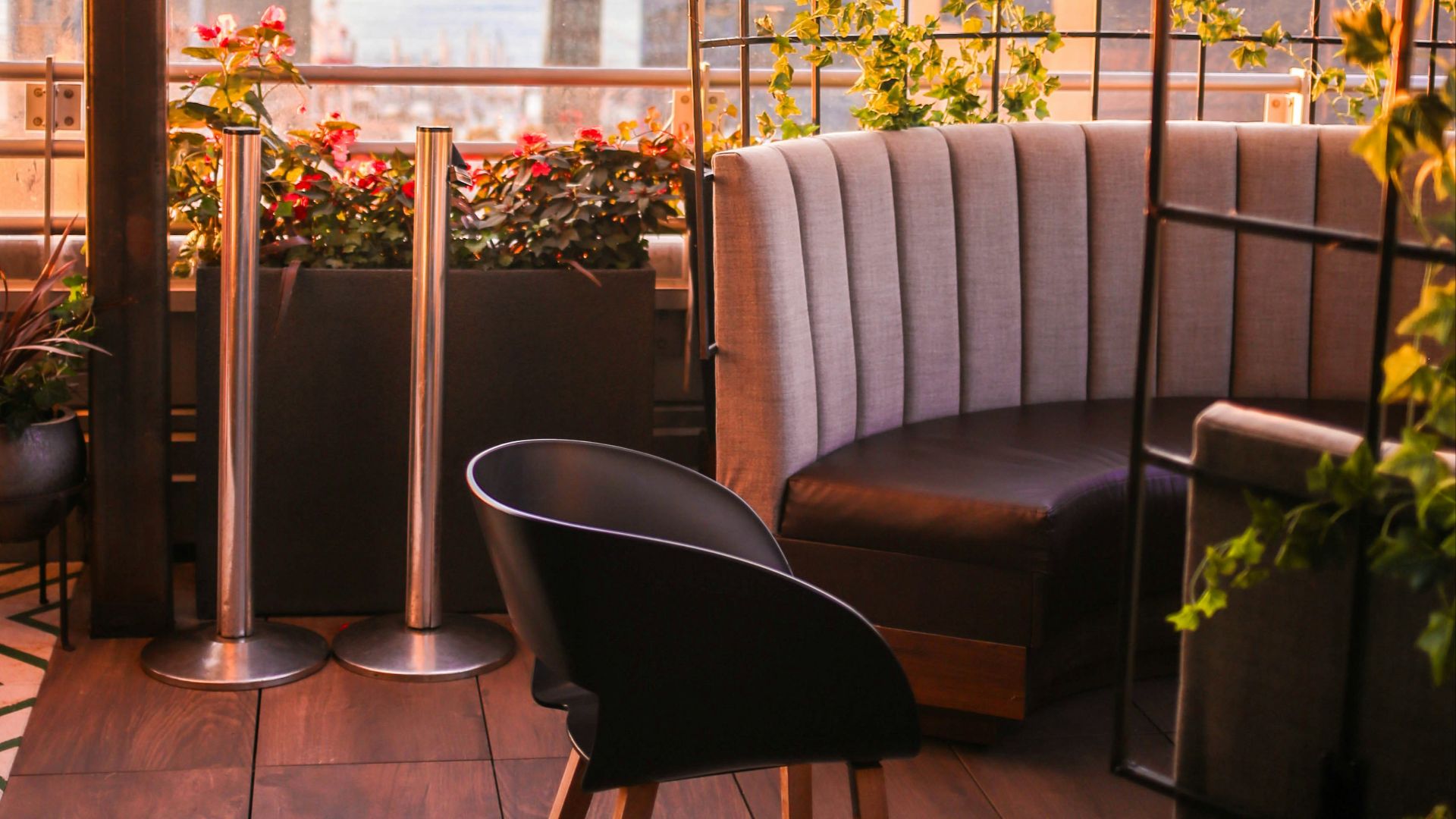 black chair near glass window