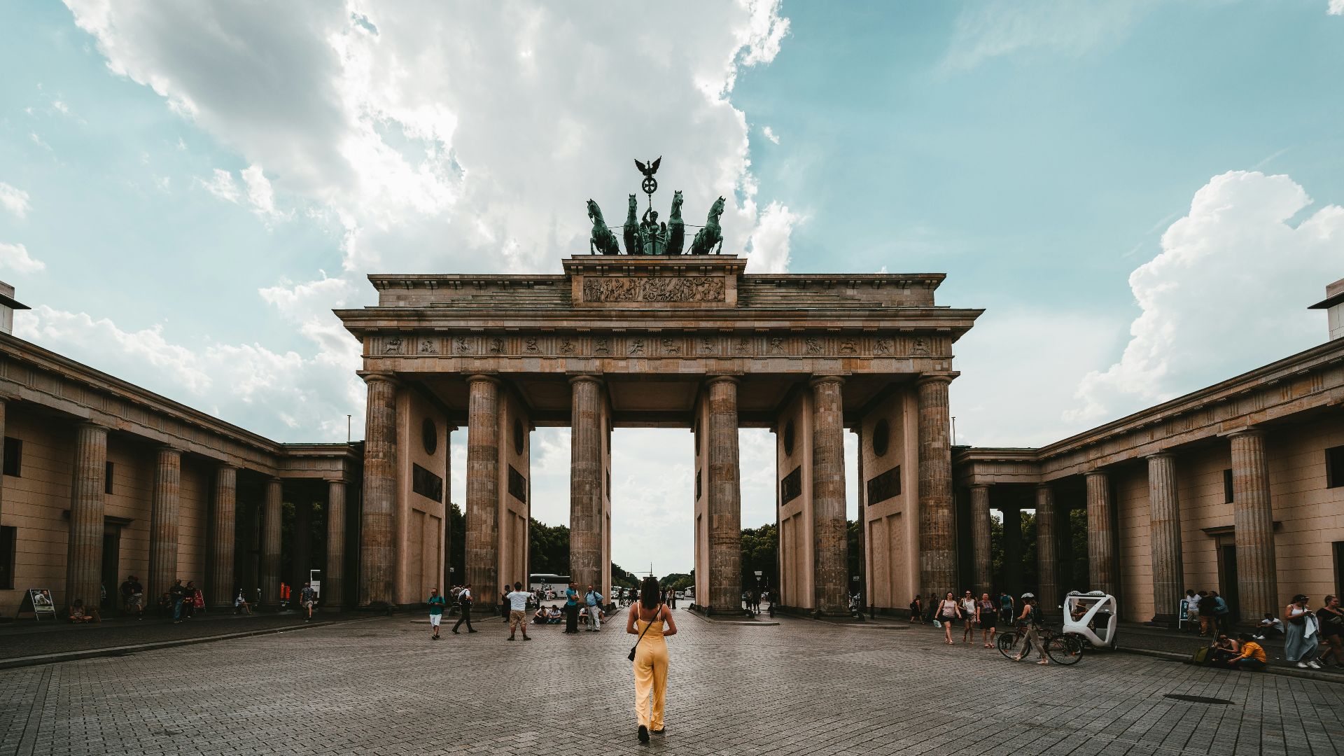 woman standing near building