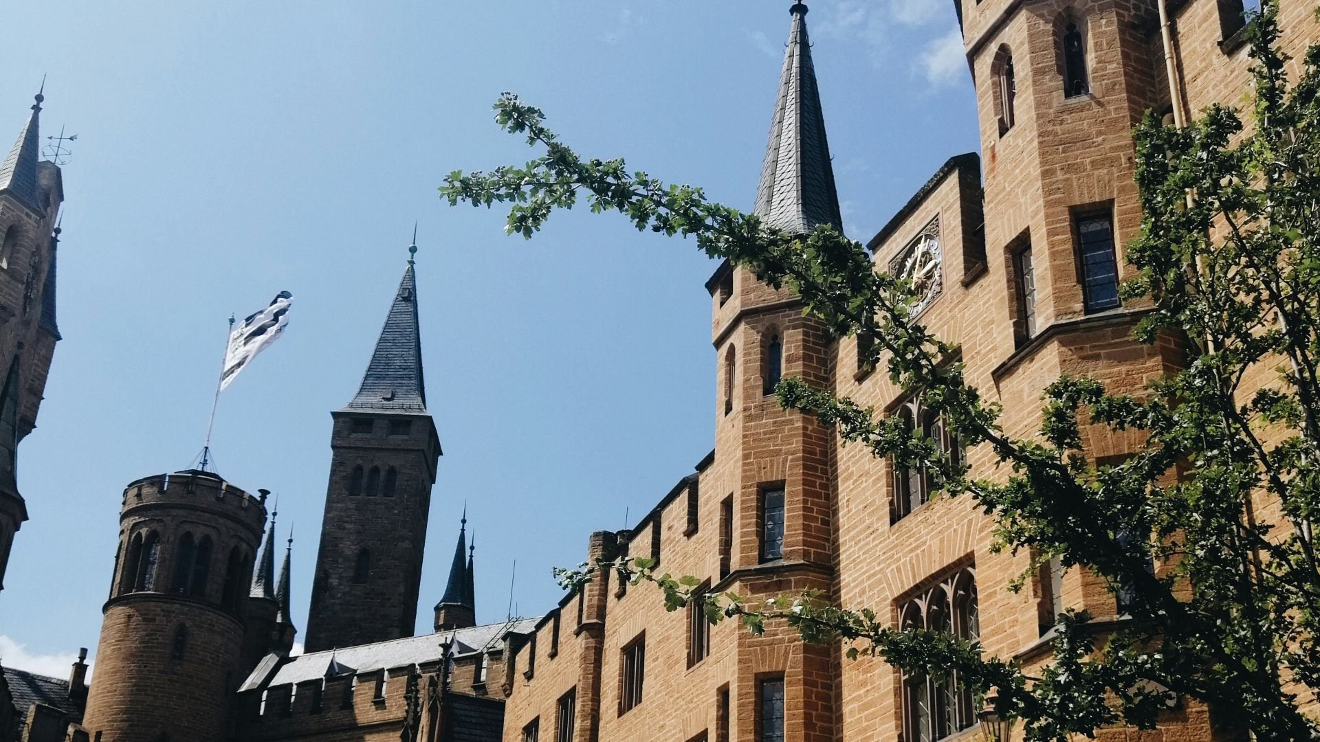 brown concrete building under blue sky during daytime