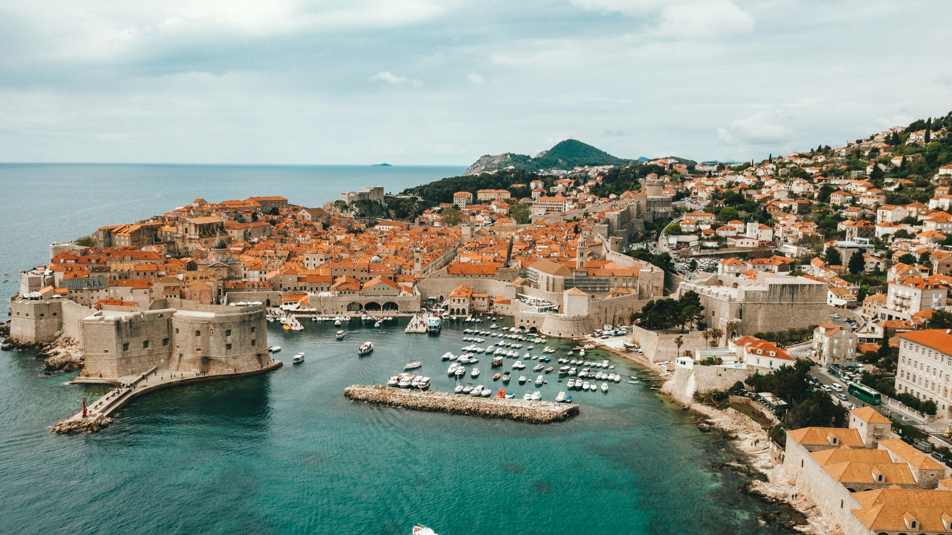 aerial view of buildings near ocean