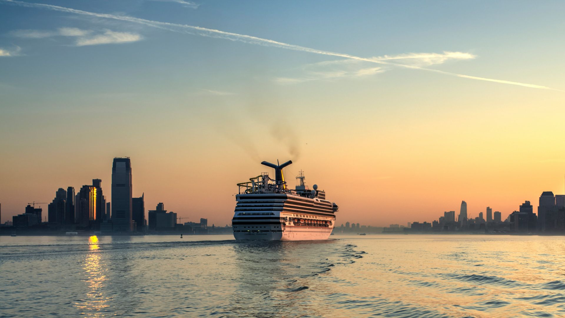 white and black cruise ship on body of water