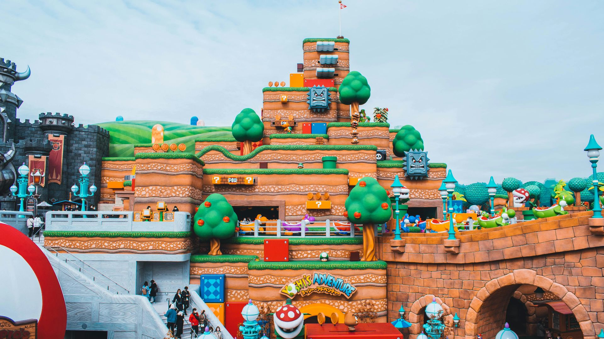 people walking near brown concrete building during daytime