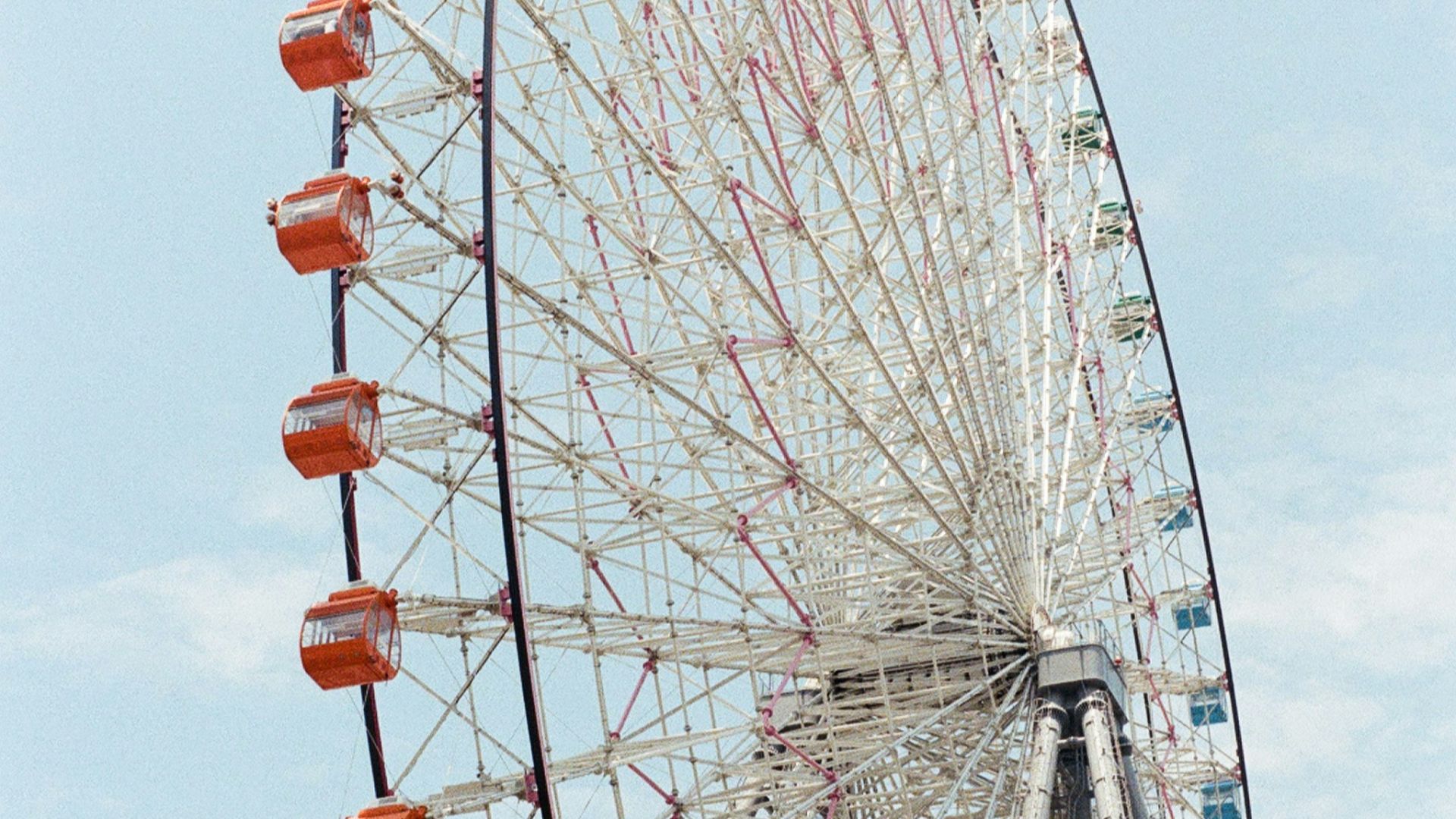 a large ferris wheel on a clear day