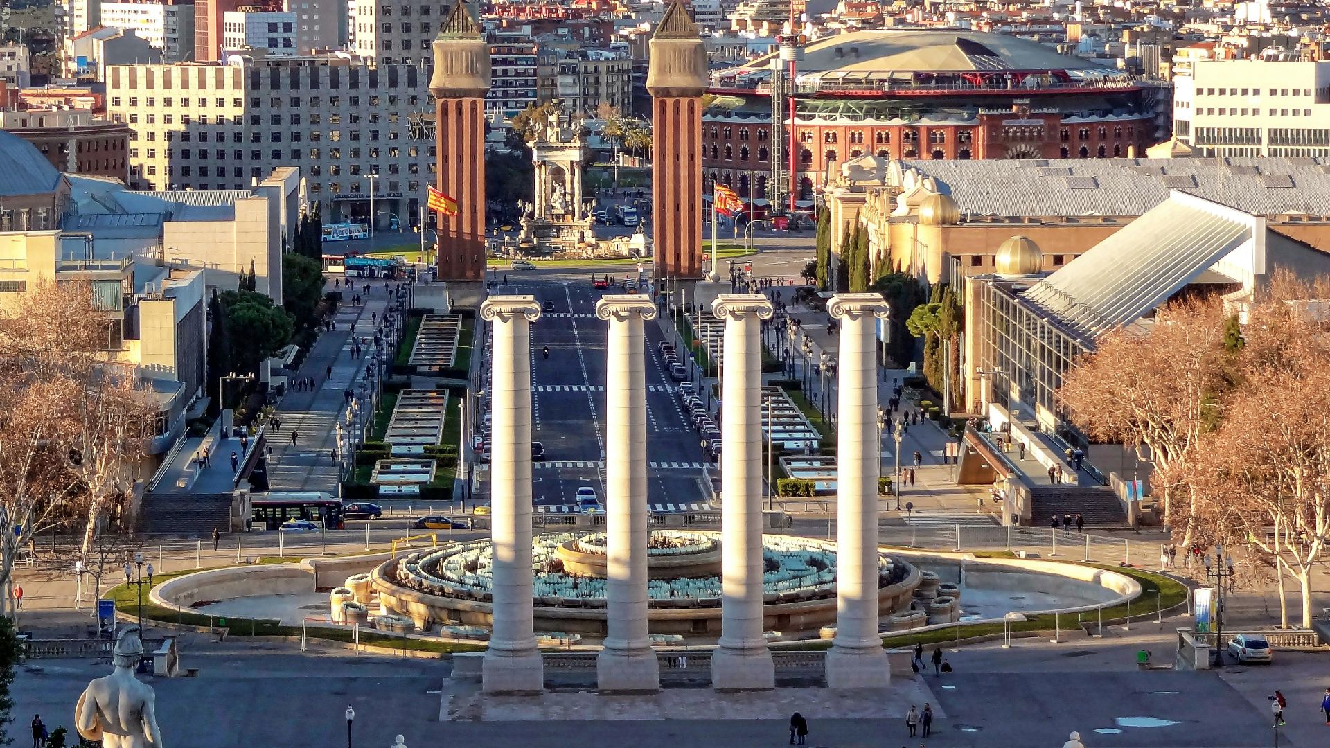 white and brown concrete buildings near body of water during daytime