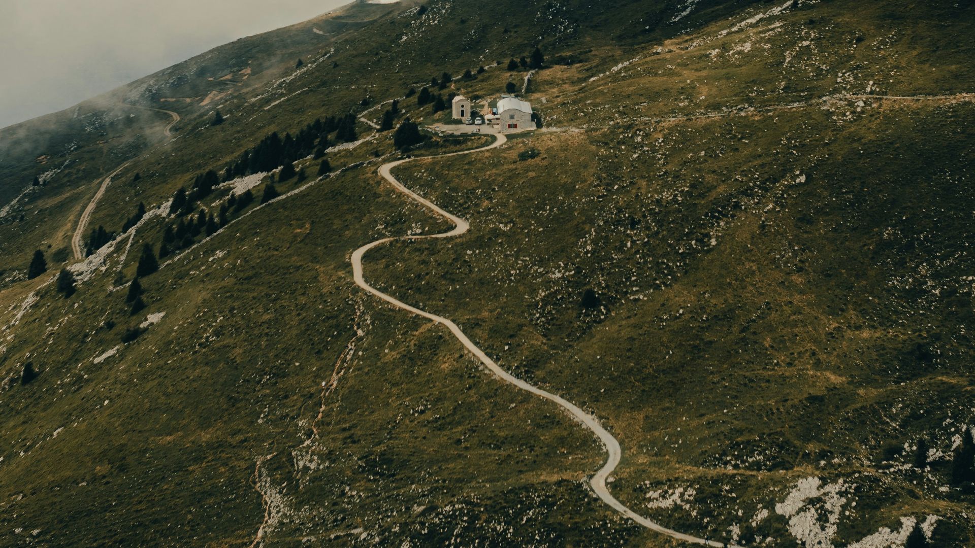 a hill with a house on top of it