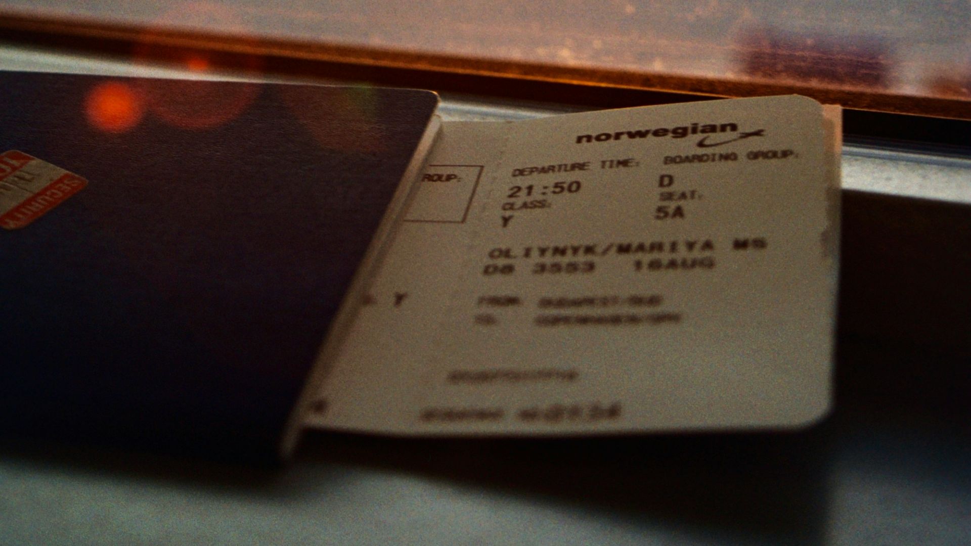 white printer paper on glass window during sunset