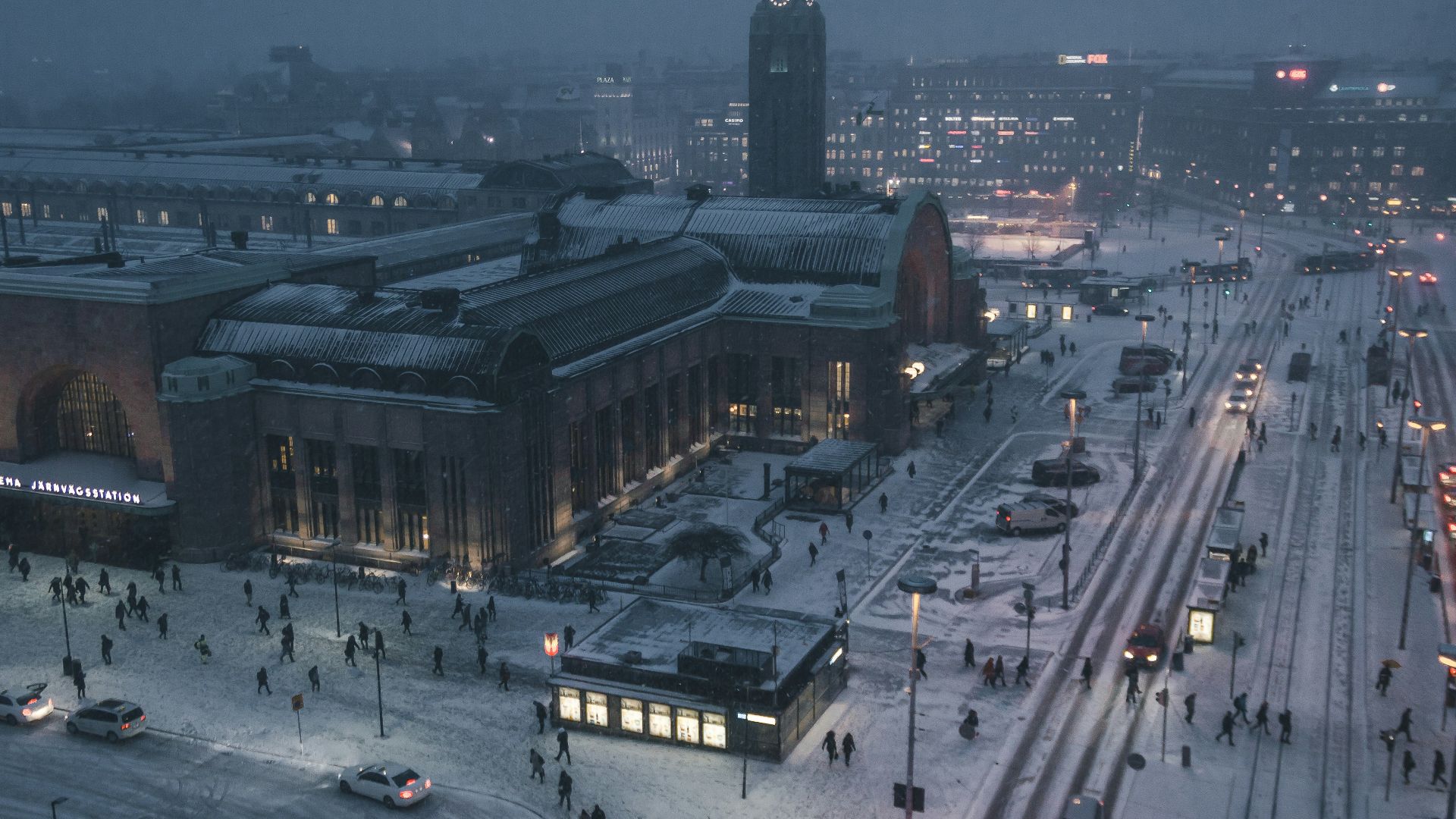 aerial photography of street at night covered with snow