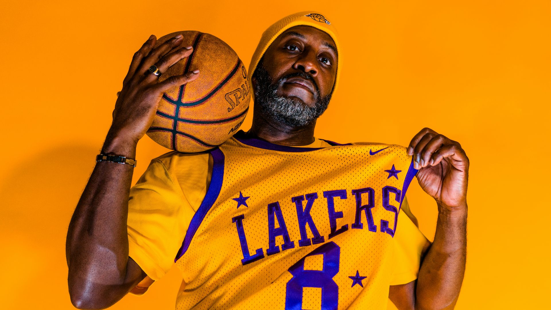 person wearing a Los Angeles Lakers jersey