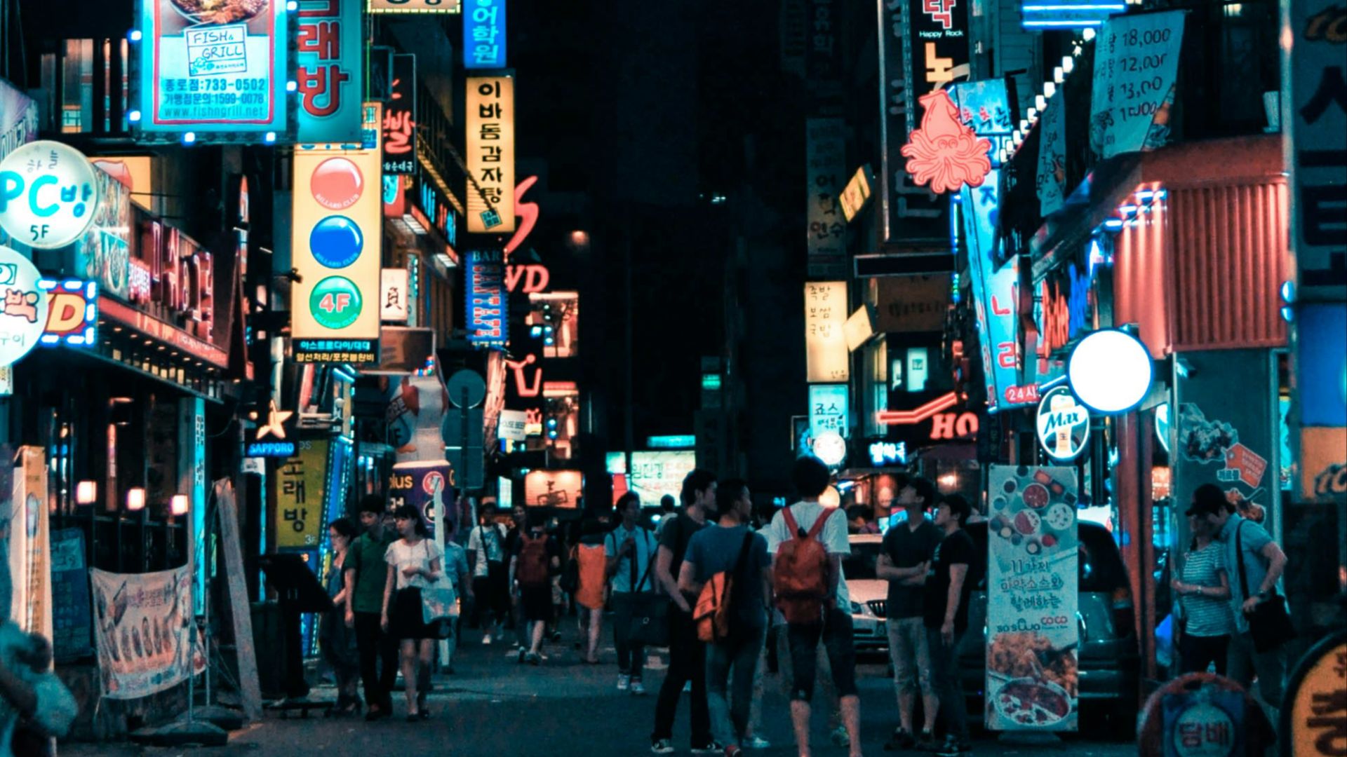 buildings with pathway surround by people