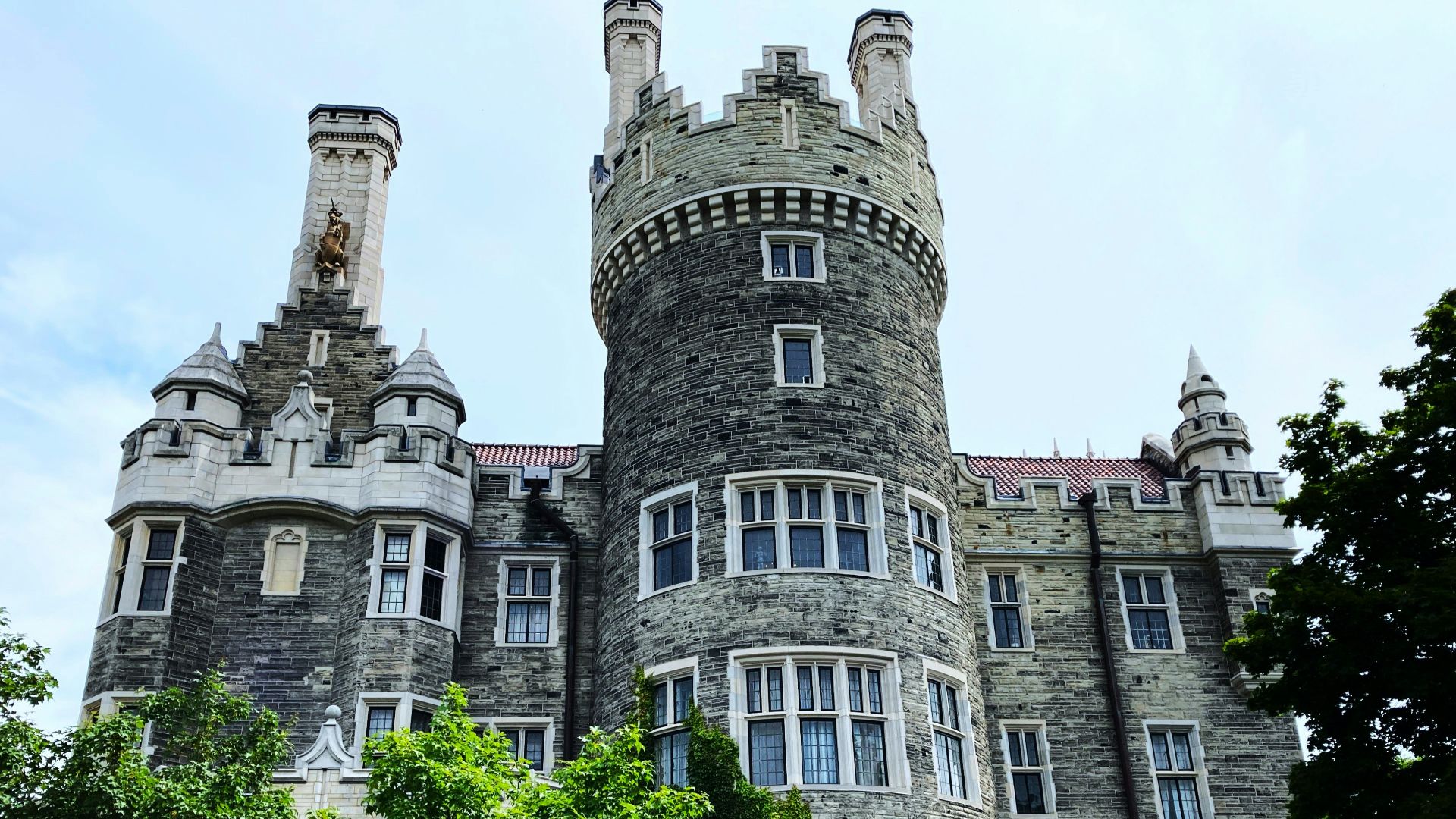 a large castle like building with a clock tower
