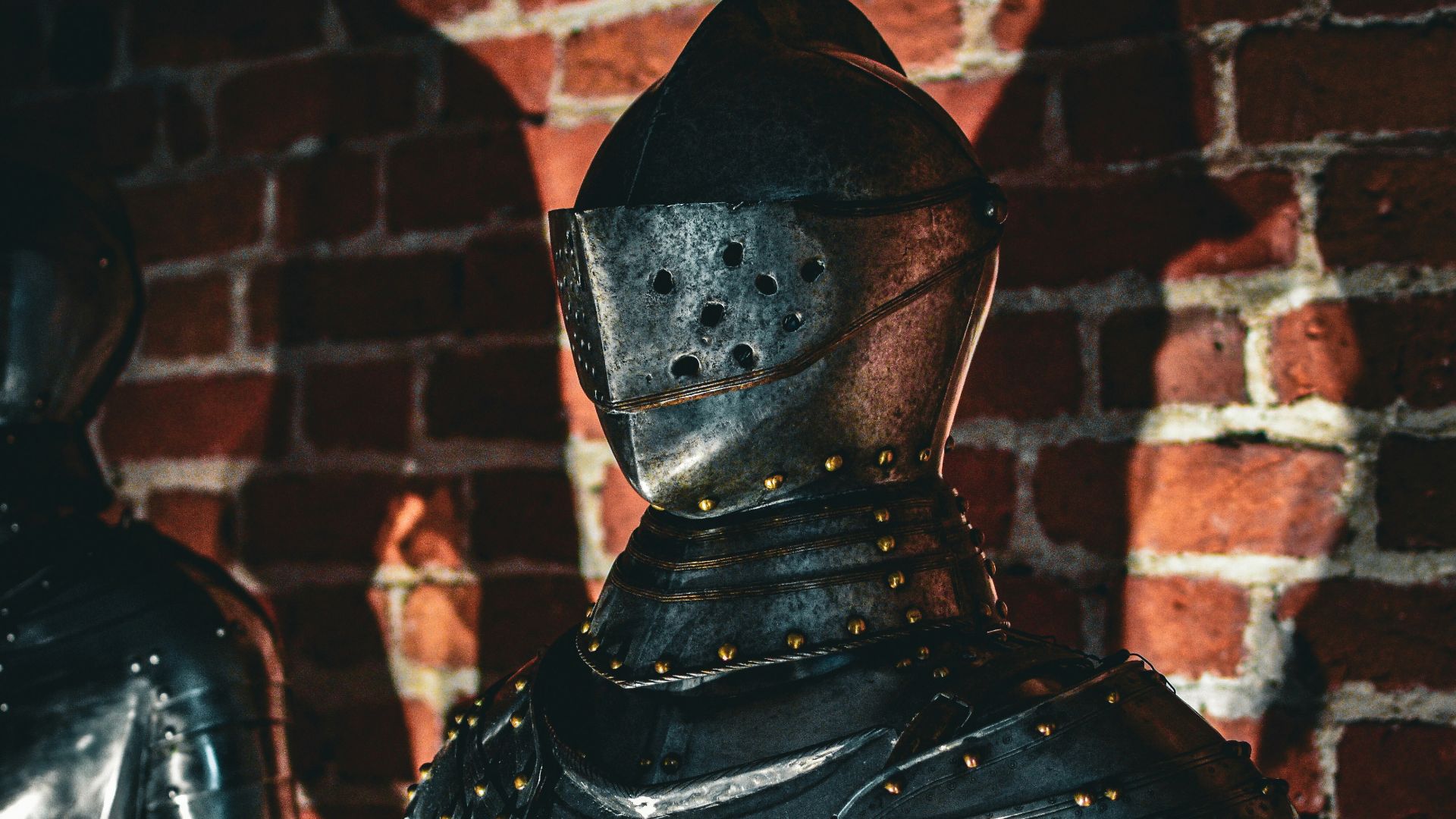 A couple of knights standing next to each other