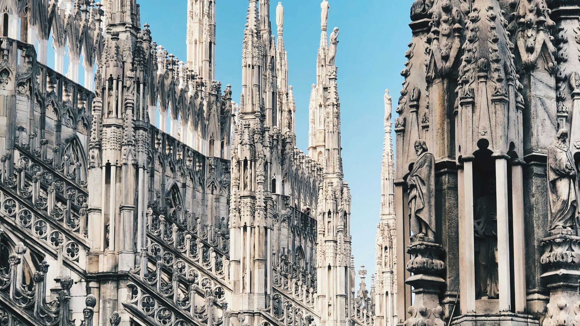 brown concrete building under blue sky during daytime