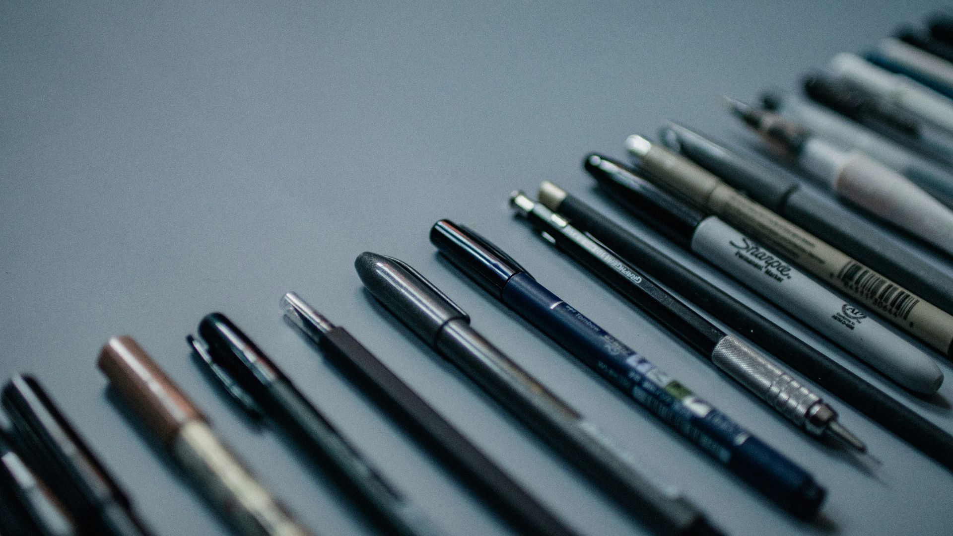 blue and silver click pen