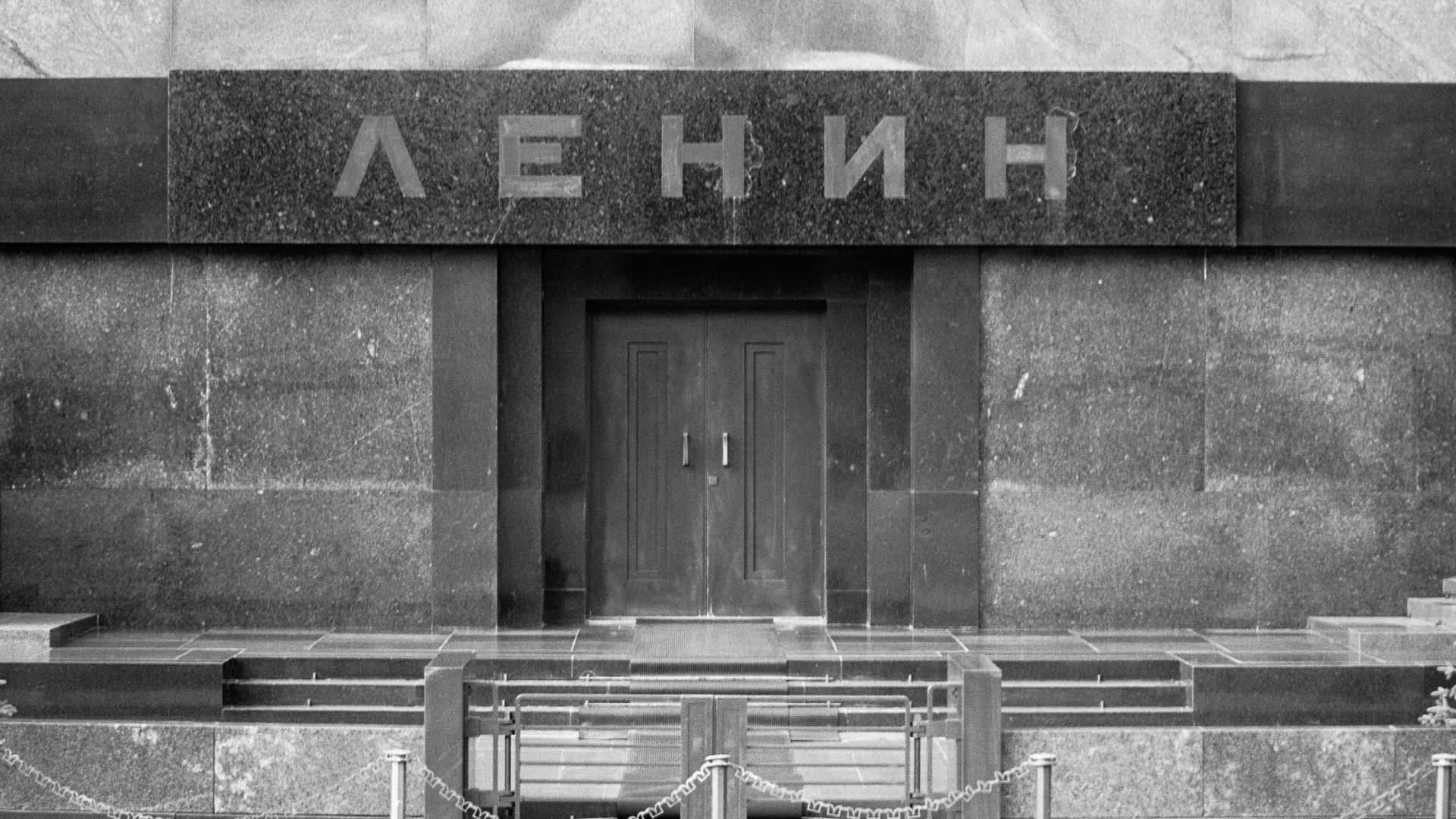 grayscale photo of concrete building