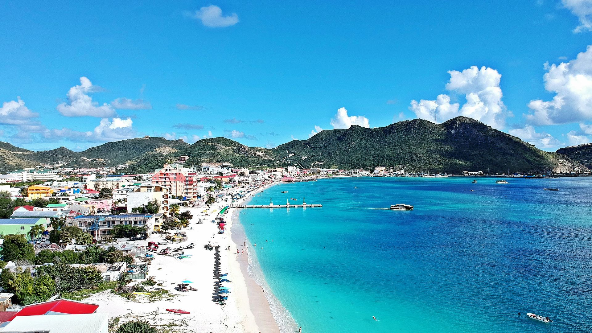 a beach with a lot of people on it