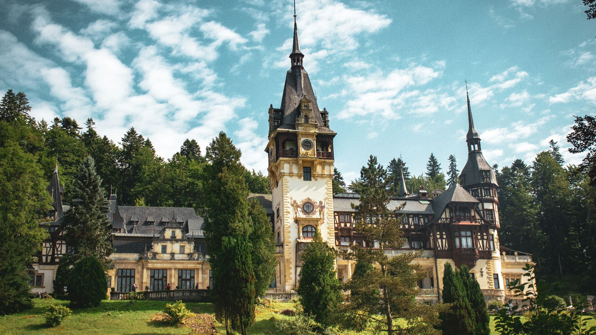 a large building with a clock on the top of it