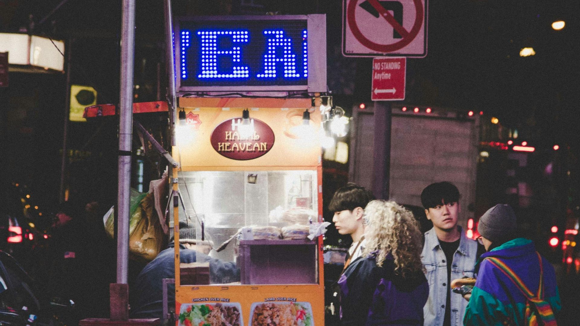 four people buying food