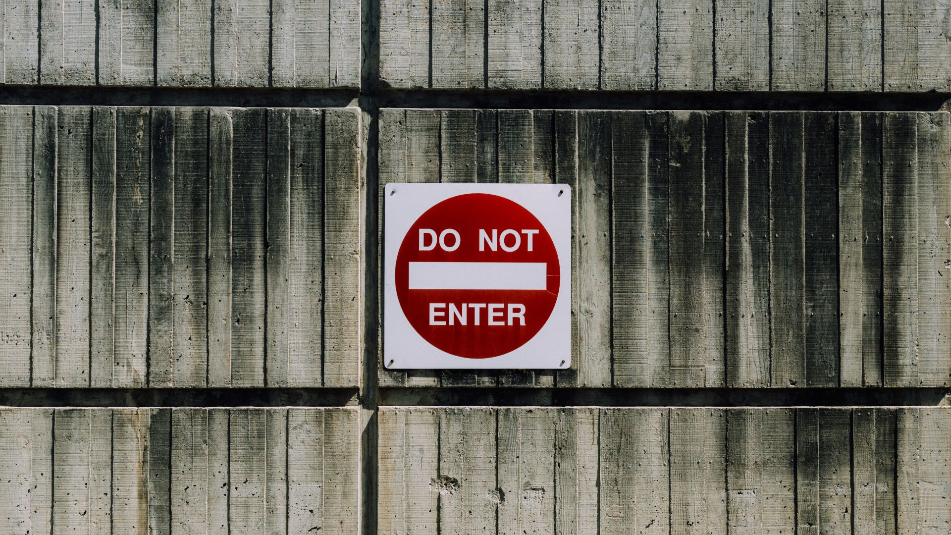 white and red do not enter signage