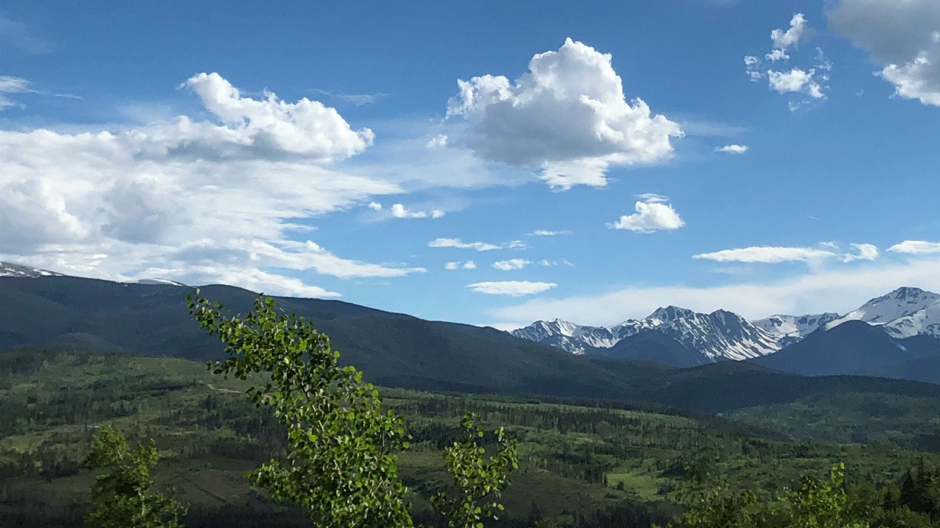 mountains under cloudy sky during daytime