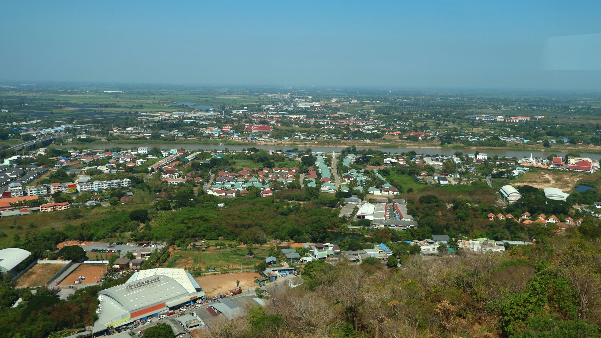 Cityscape view under a clear blue sky.