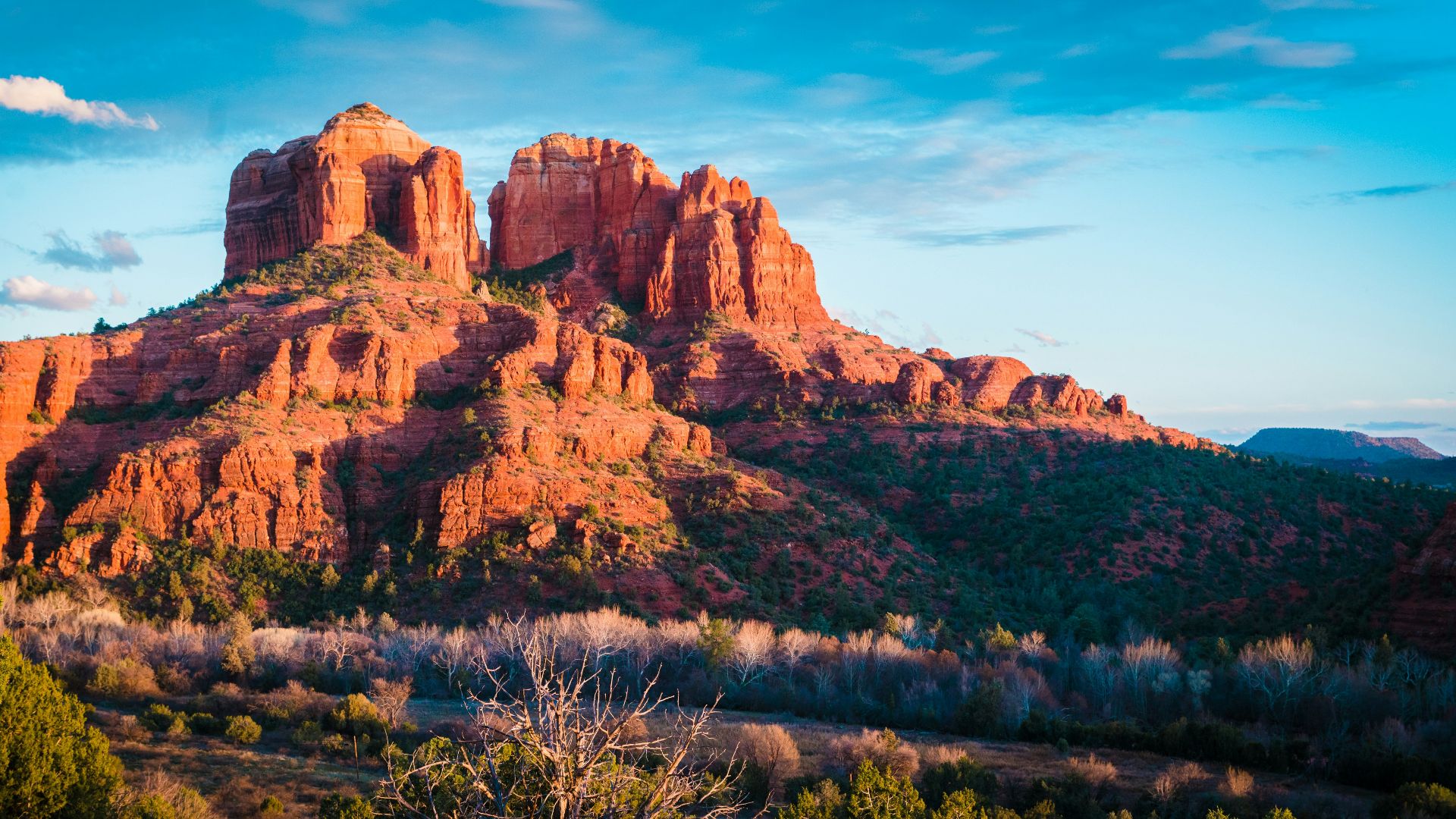 brown rocky mountain under blue sky during daytime