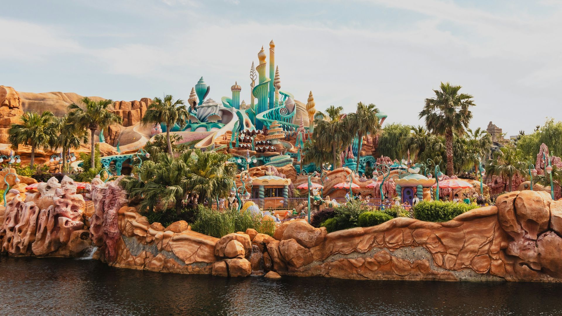 A large body of water with a castle in the background