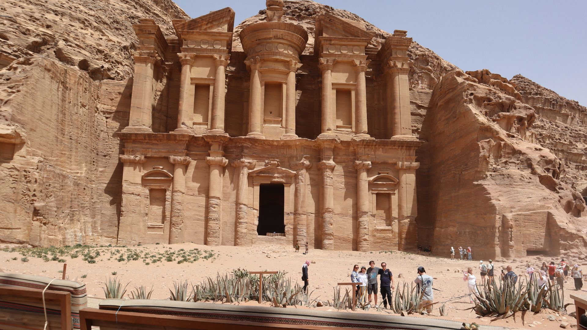 a group of people standing in front of a building