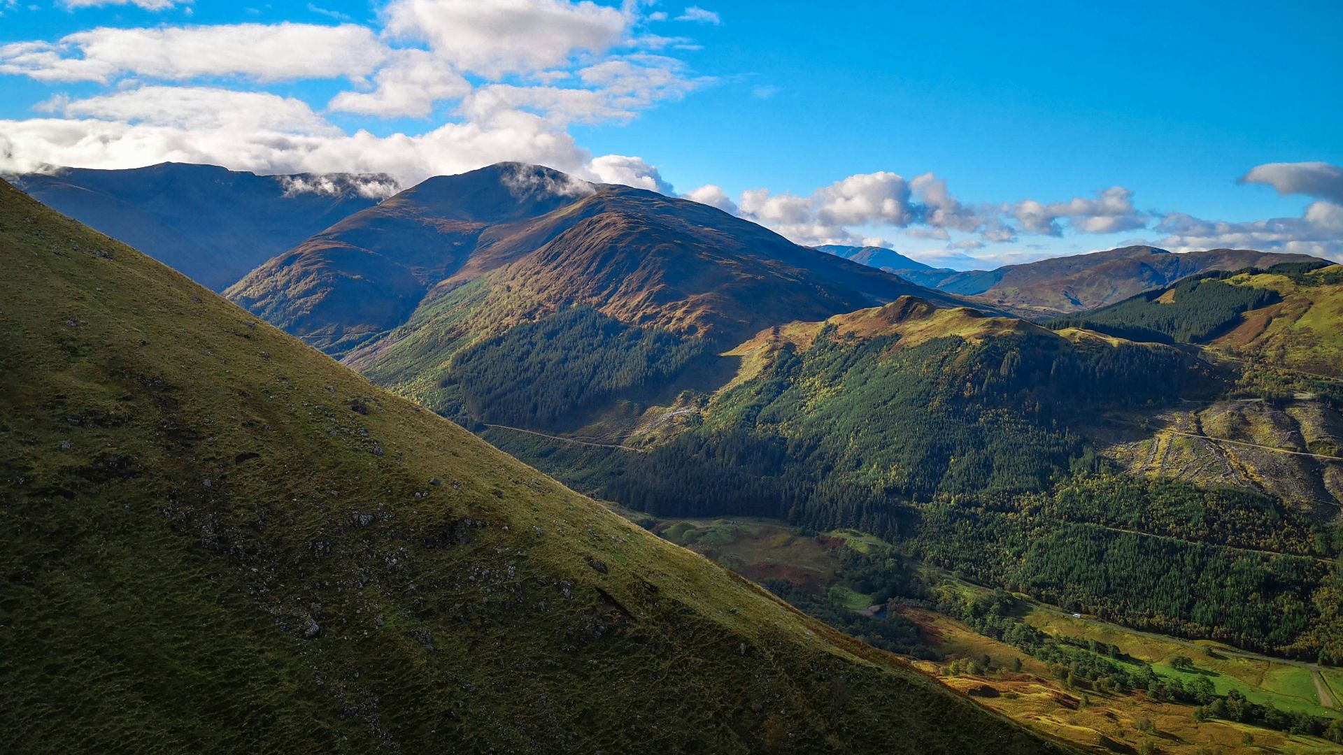 green and brown mountain under blue sky during daytime