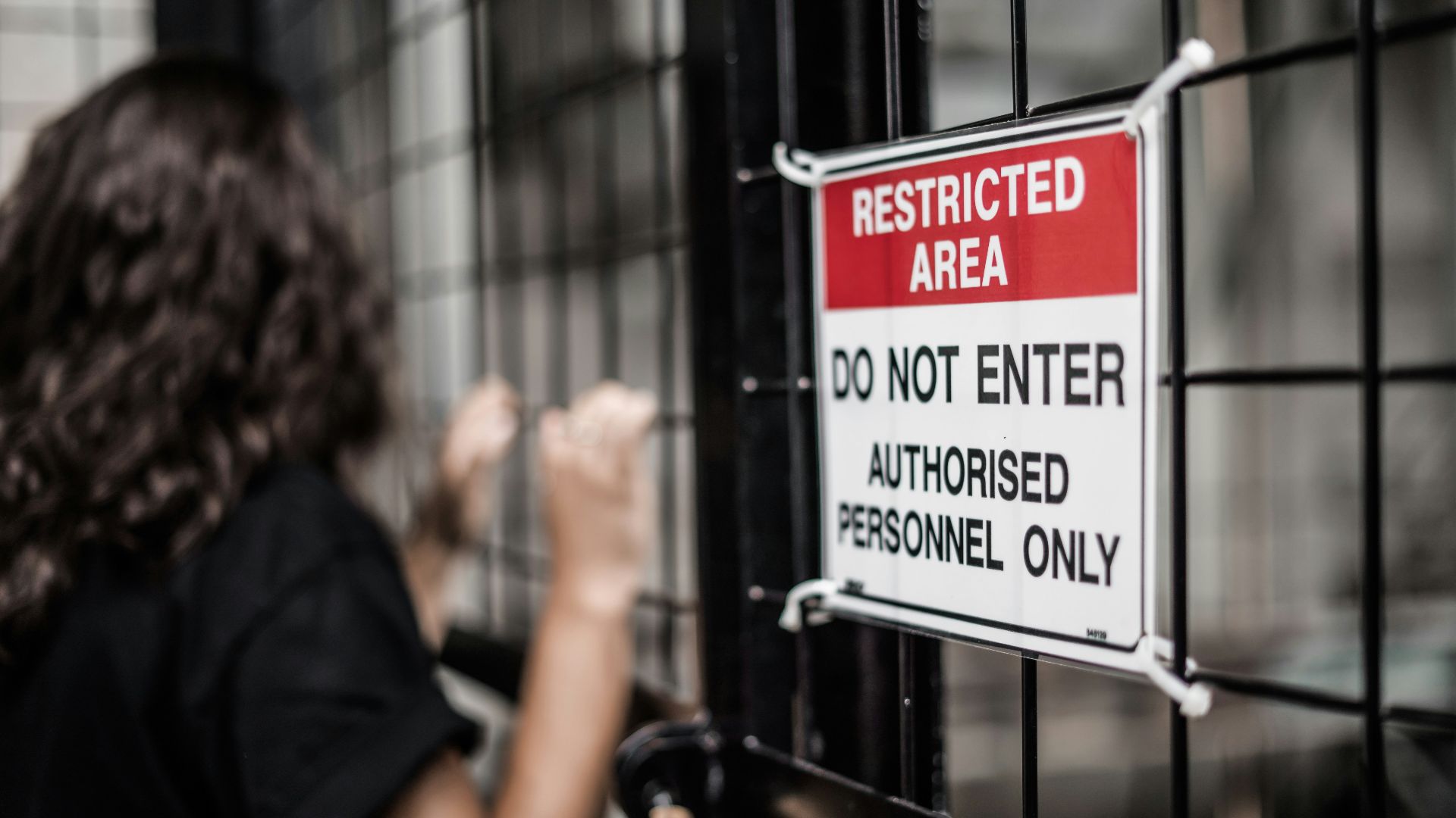 Restricted Area sign at the cyclone fence