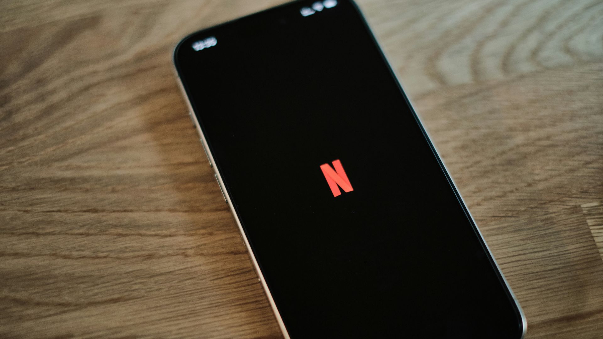 A close up of a cell phone on a table