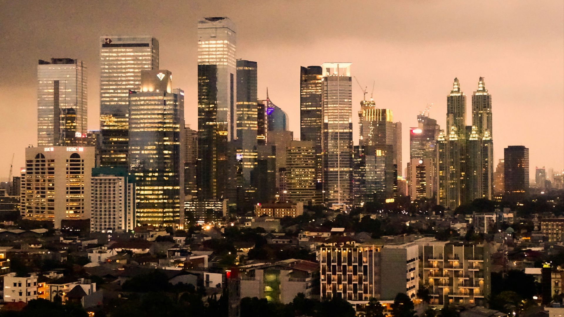 city with high-rise buildings during night time