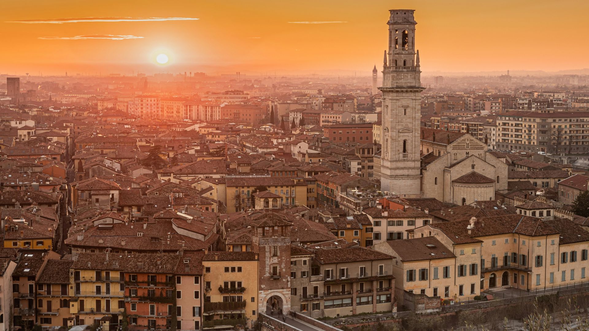 city with high rise buildings during sunset