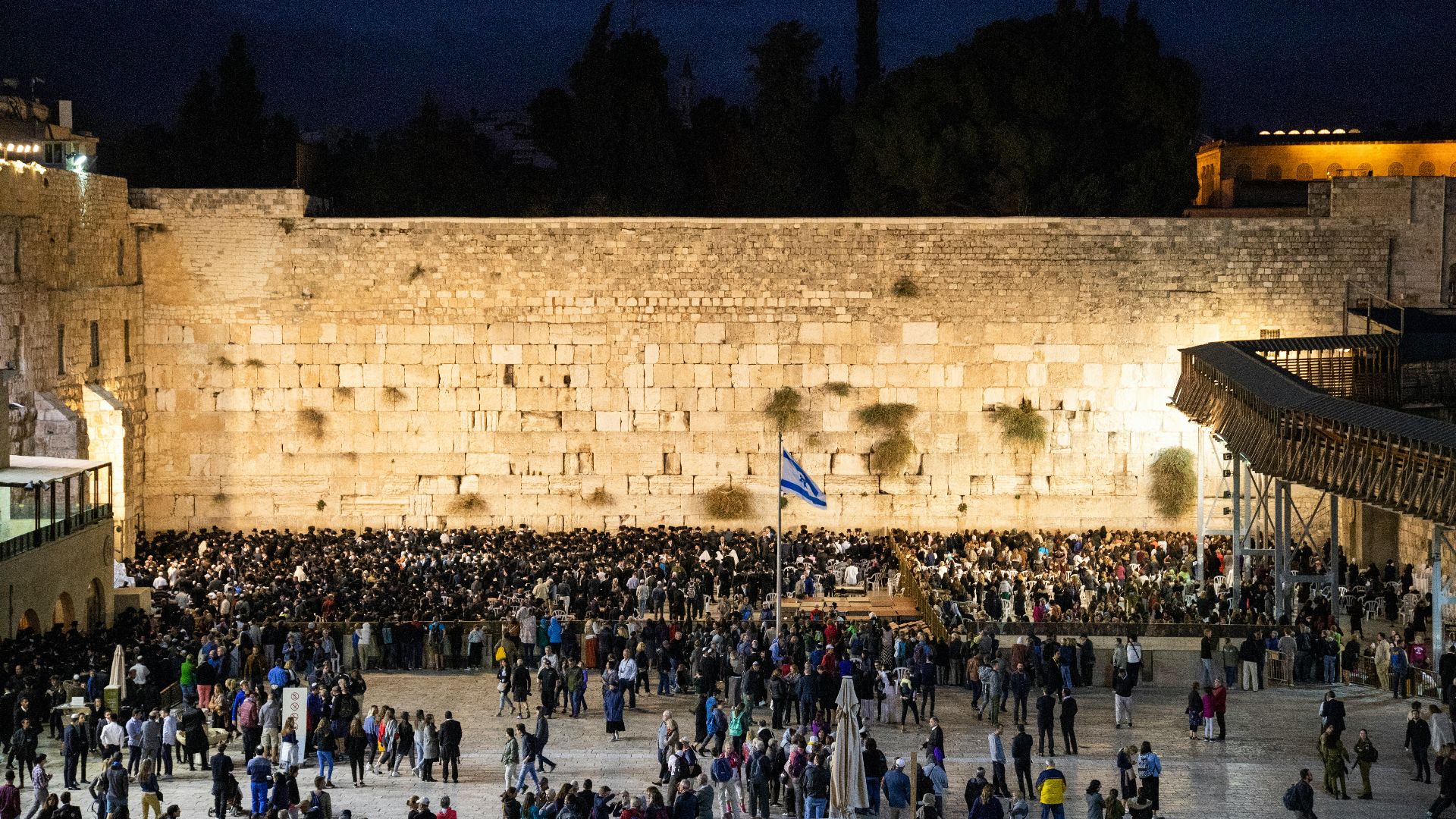 people gathered near pole
