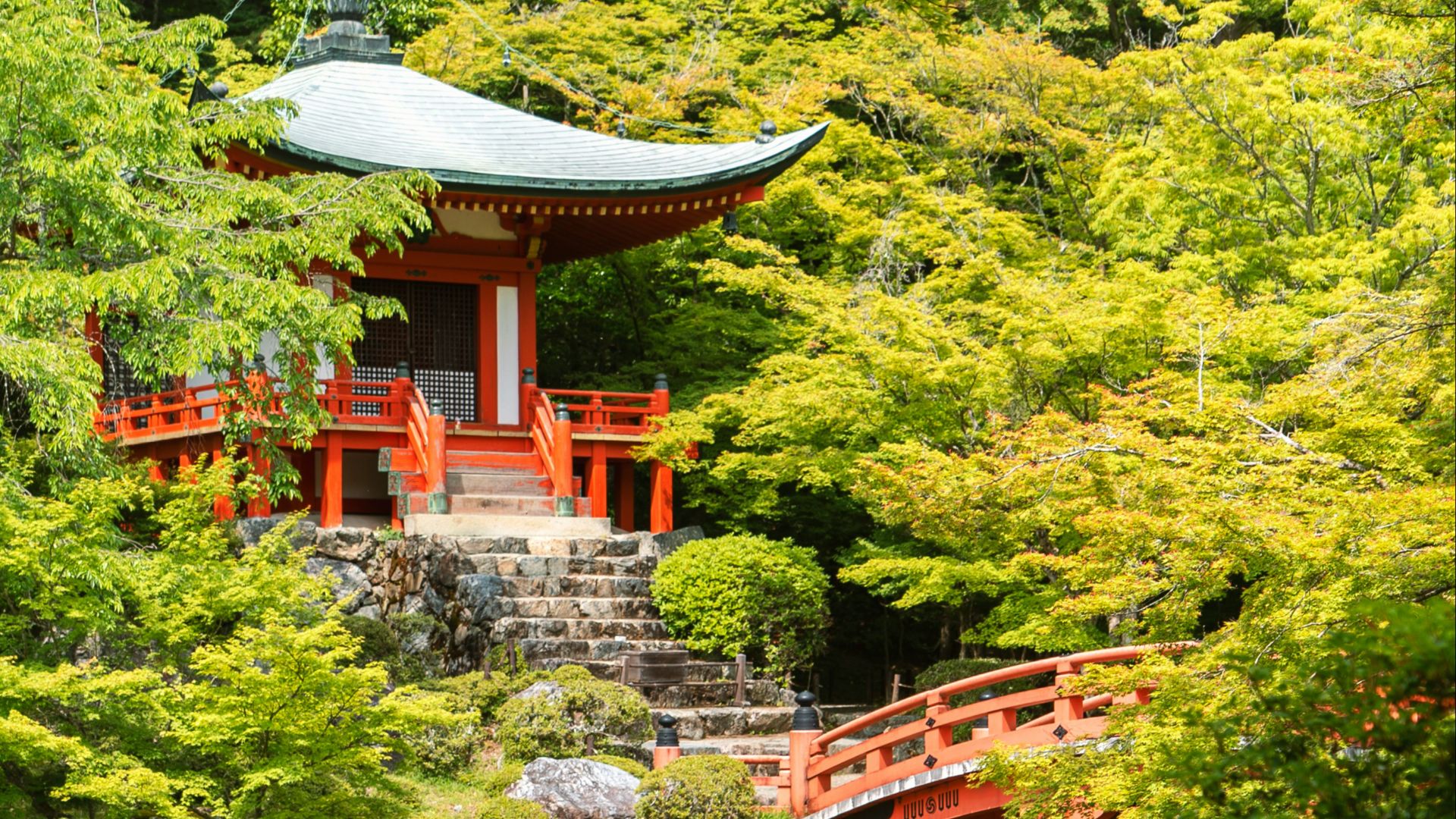 red temple near body of water