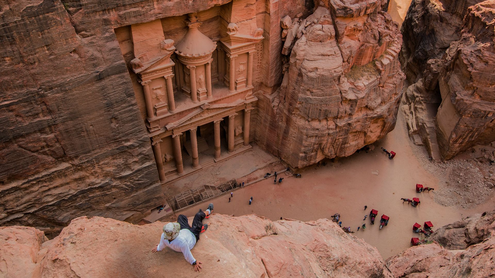 people walking on brown rocky mountain during daytime
