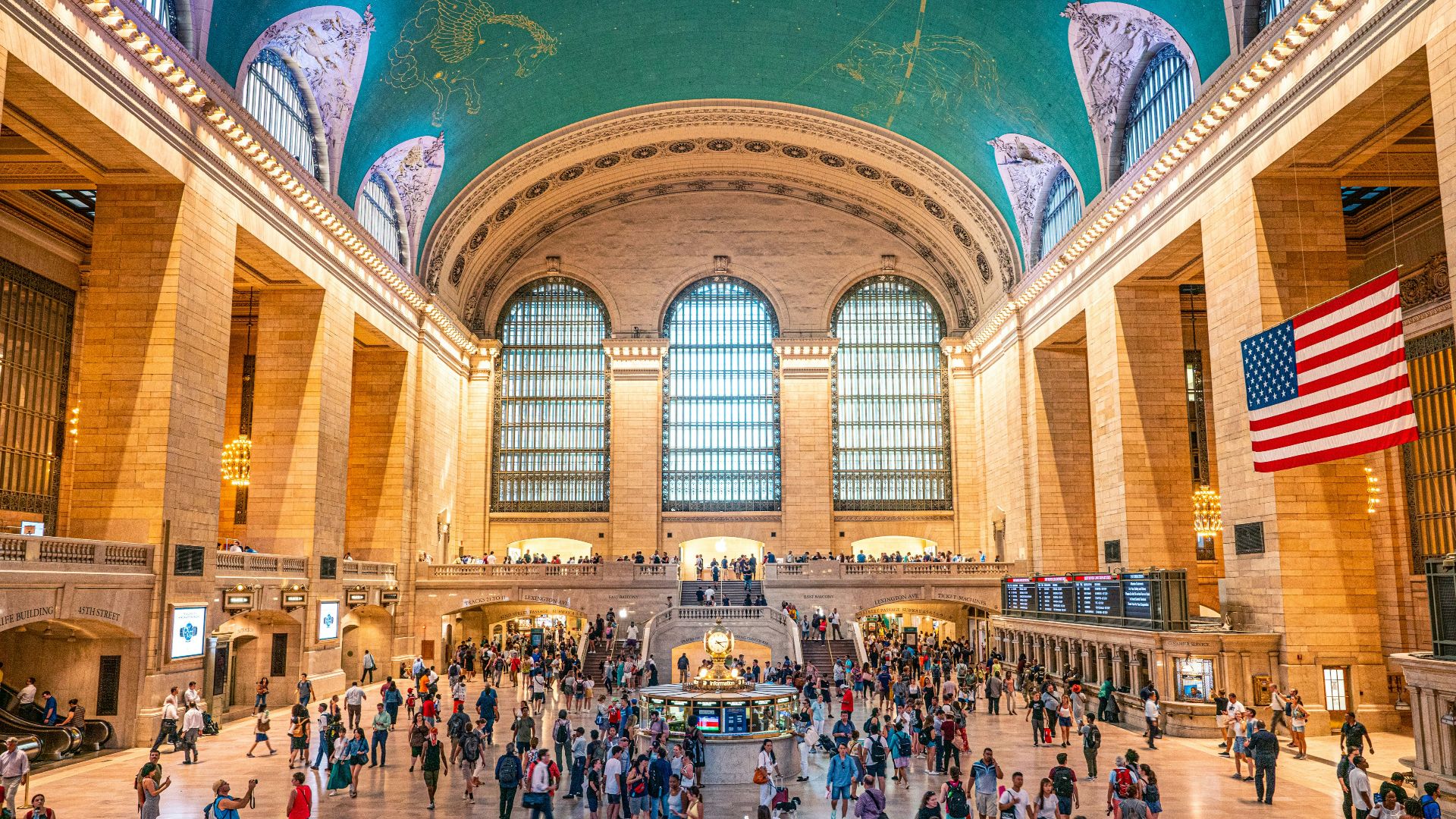 crowd of people walking in Grand Central Terminal