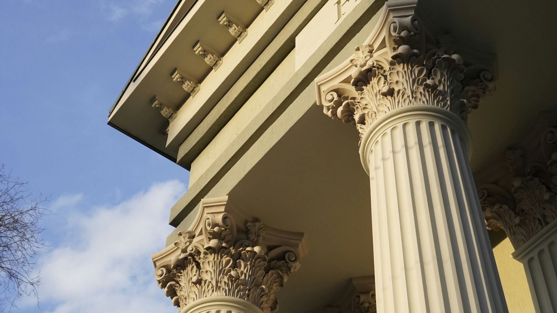 a close up of the columns of a building