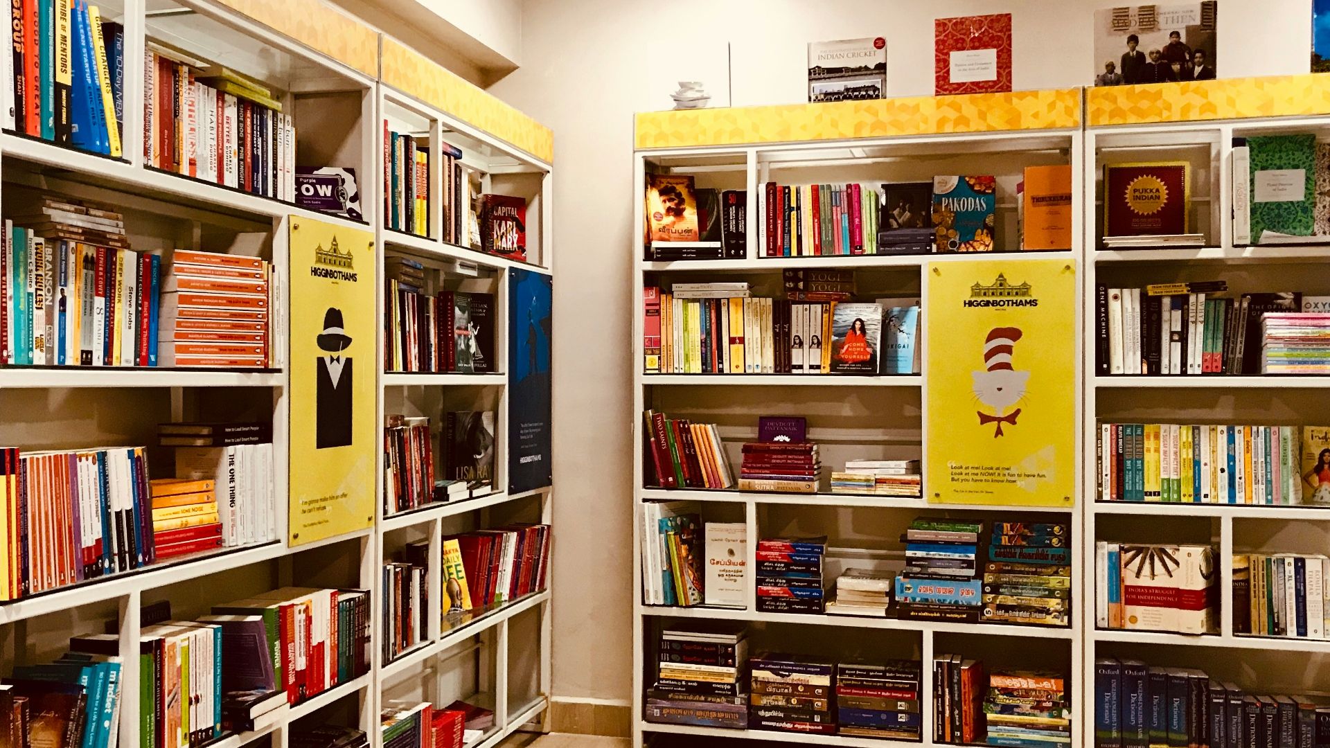 books on brown wooden shelves