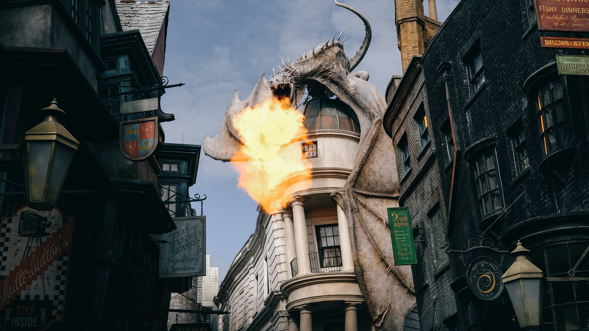 a large building with a dragon on top of it