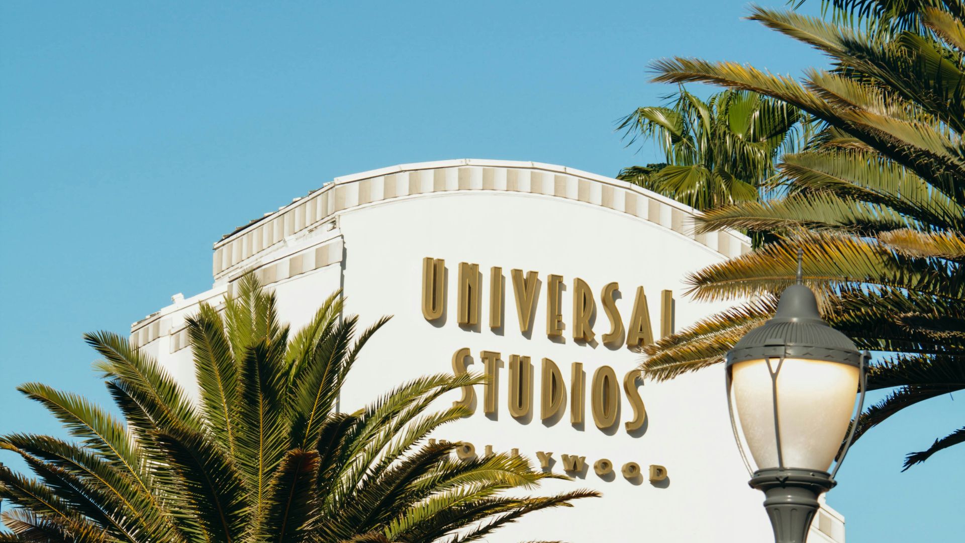 a large white building with a sign on it