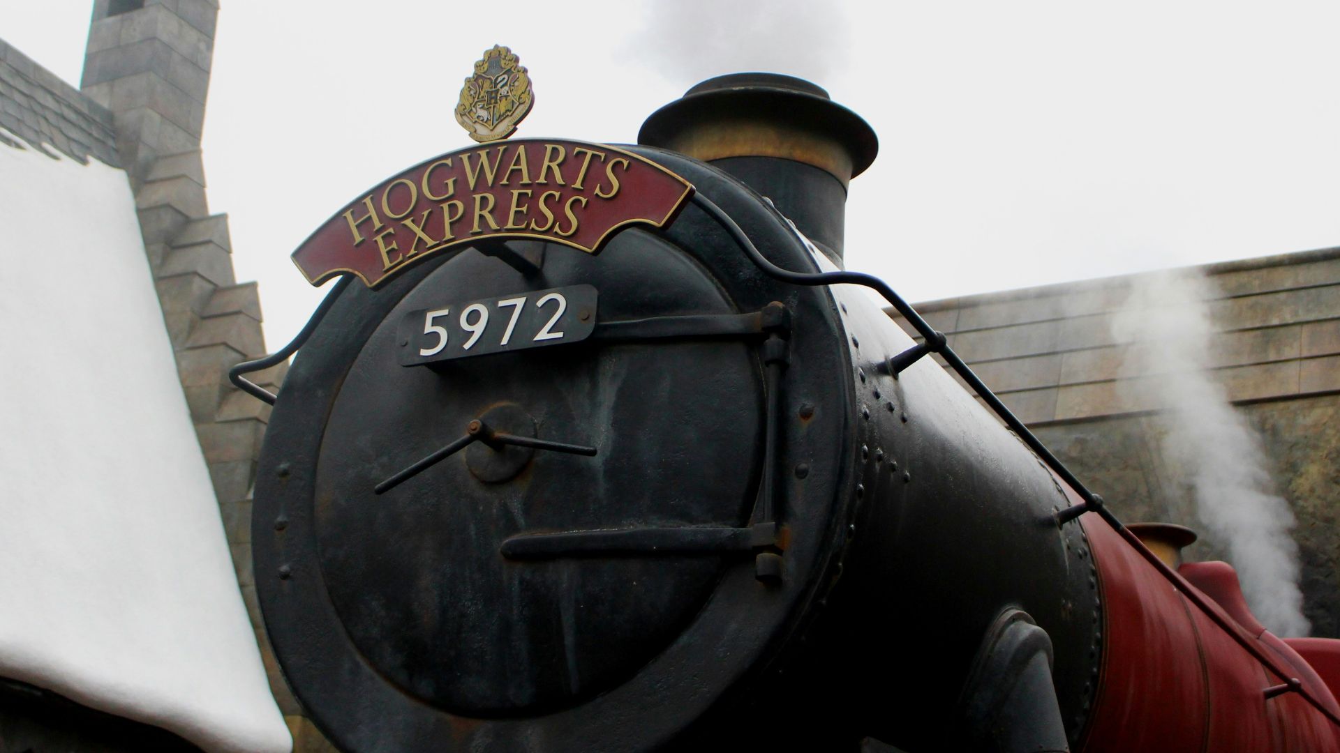 low angle photography of black and red freight train