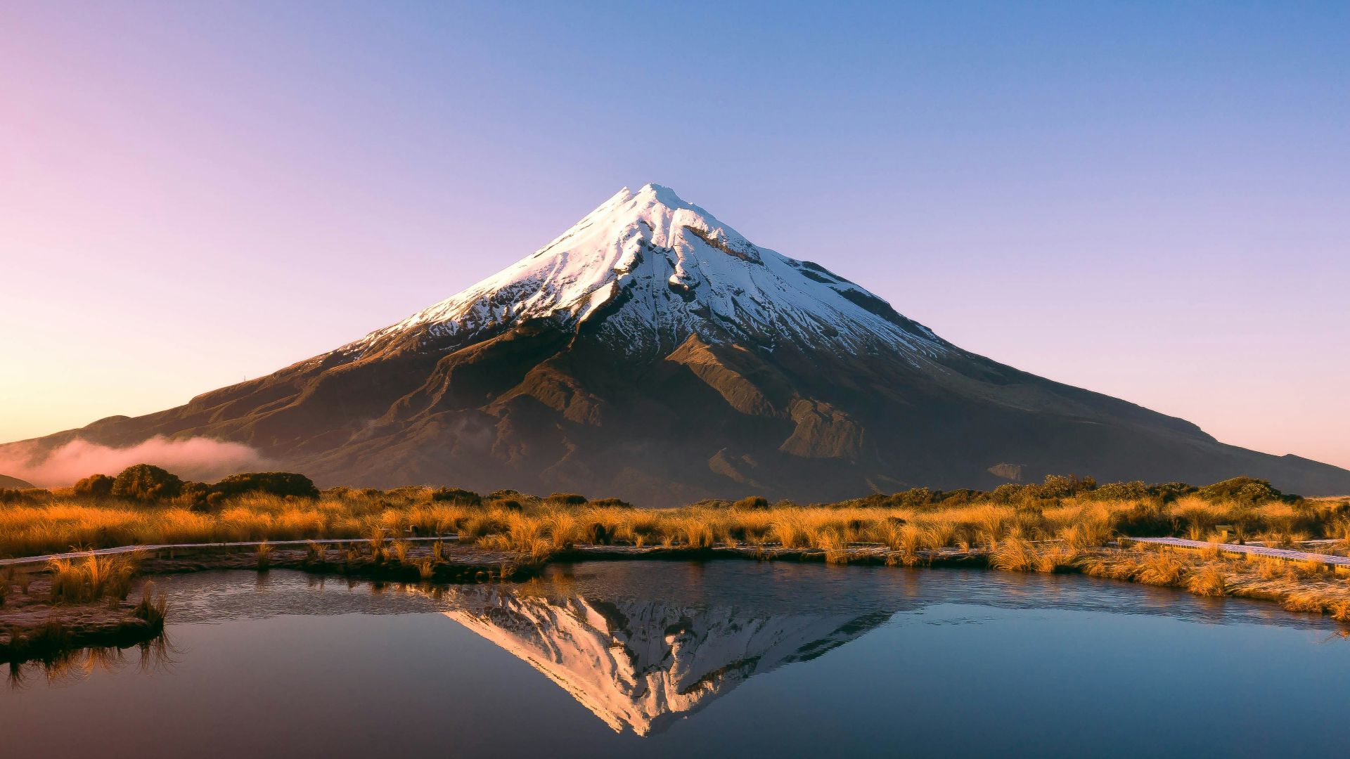 mountain near body of water during daytime