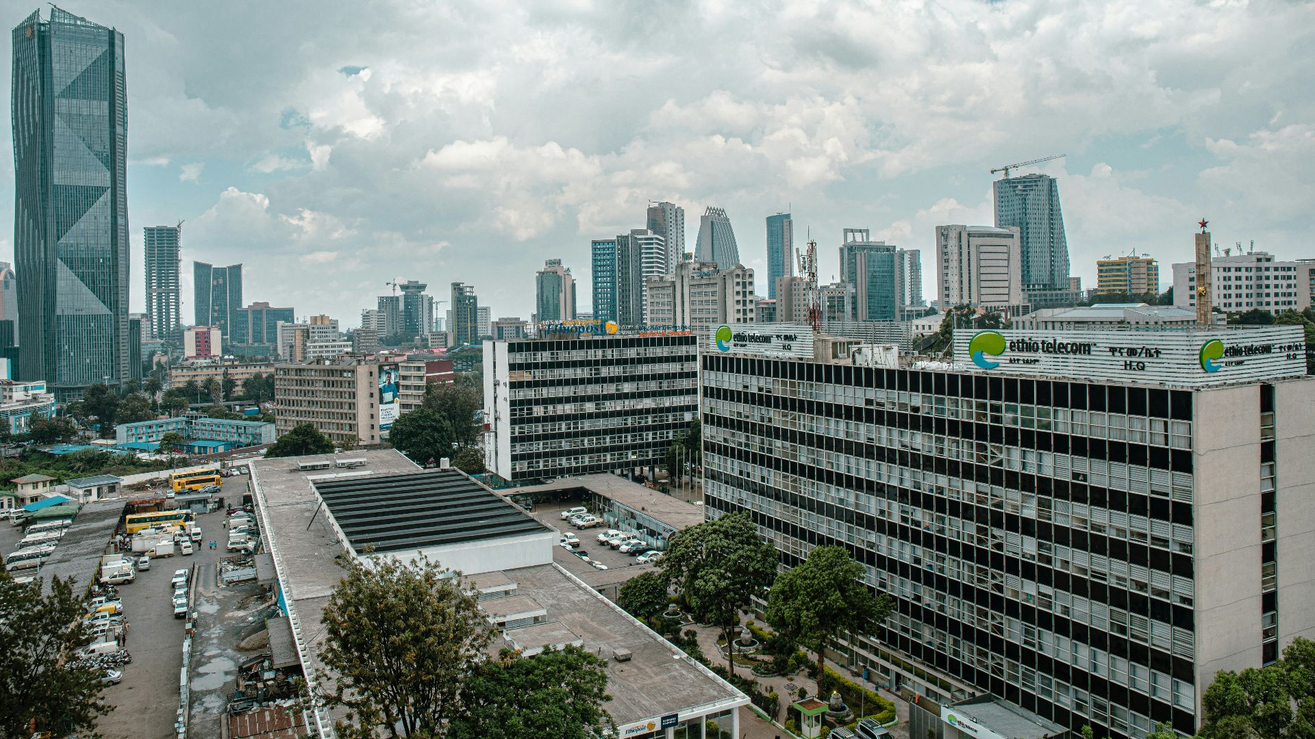 a view of a city with tall buildings