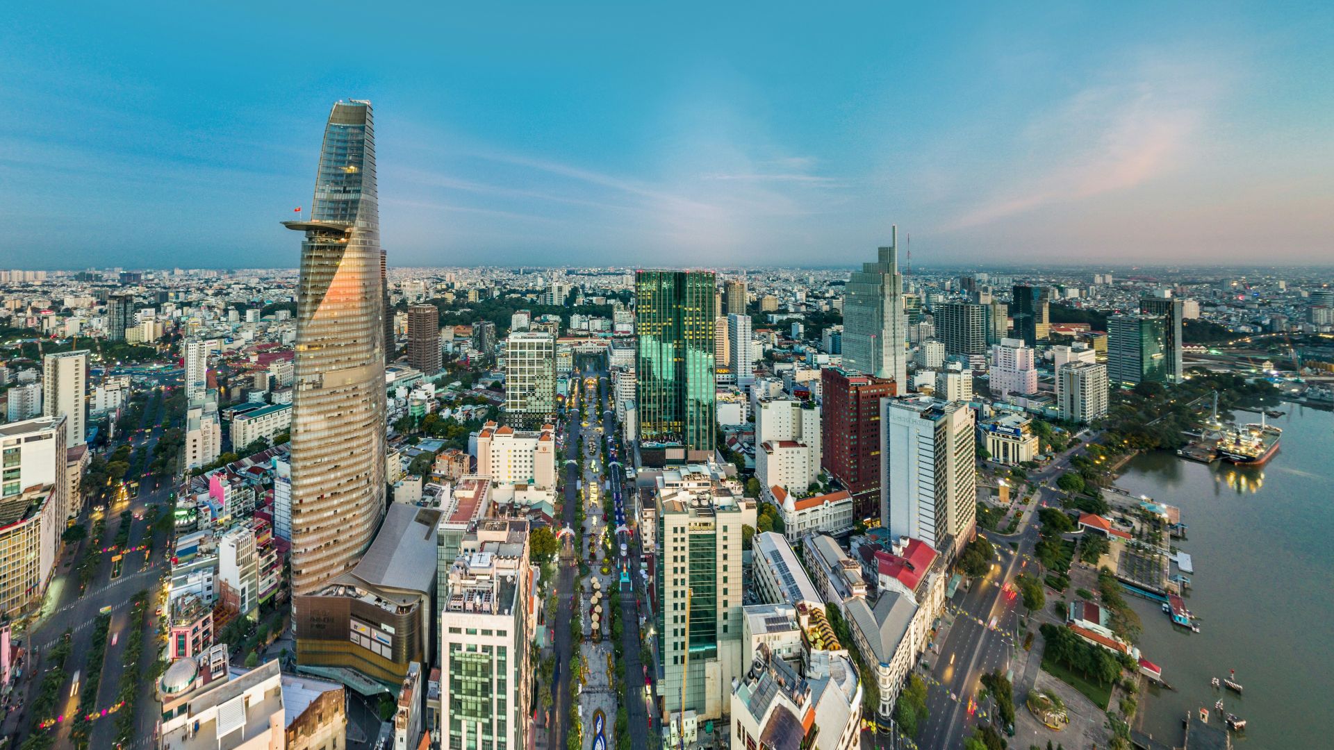 high-rise building near body of water during daytime