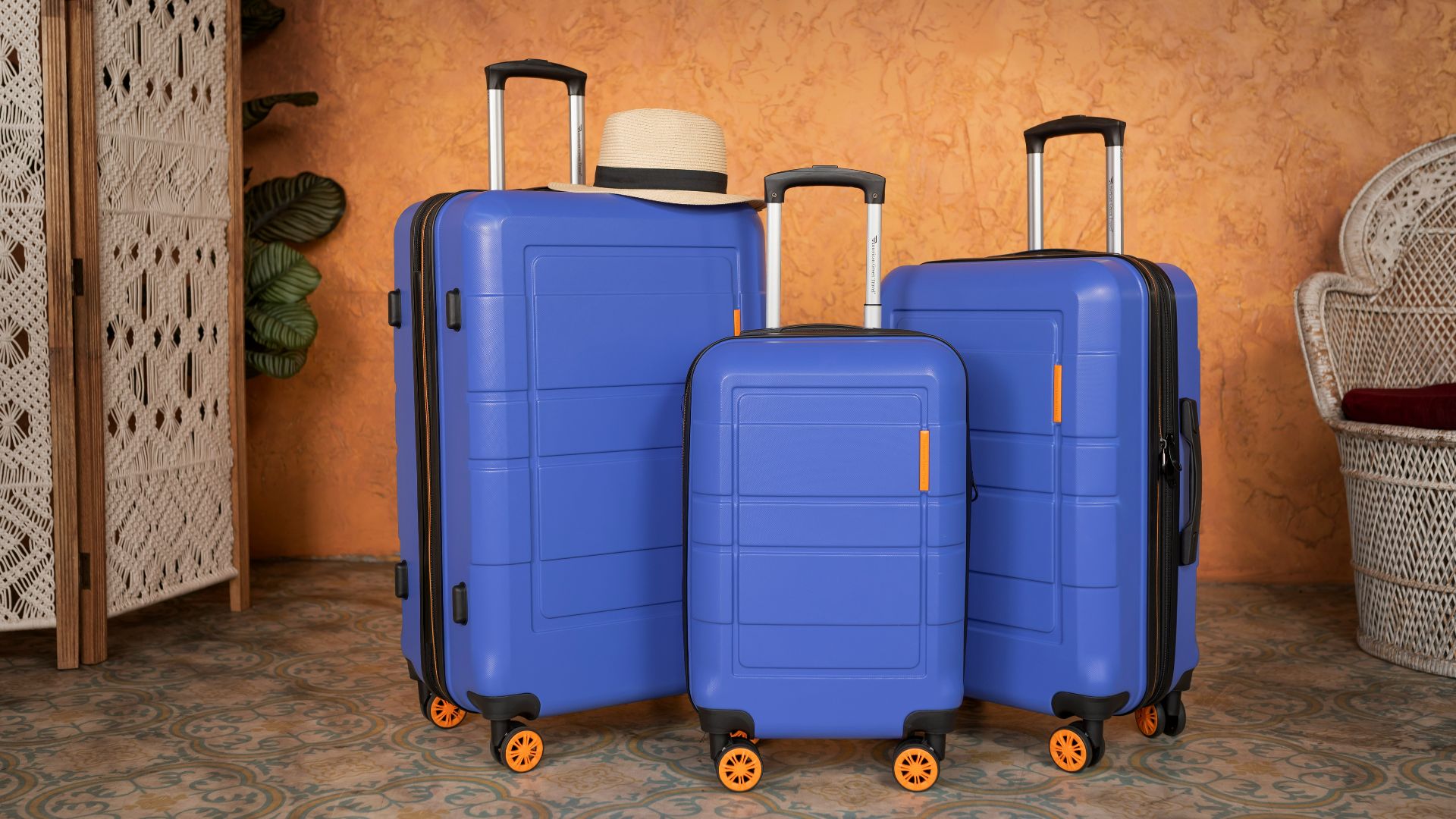 three pieces of blue luggage sitting next to each other