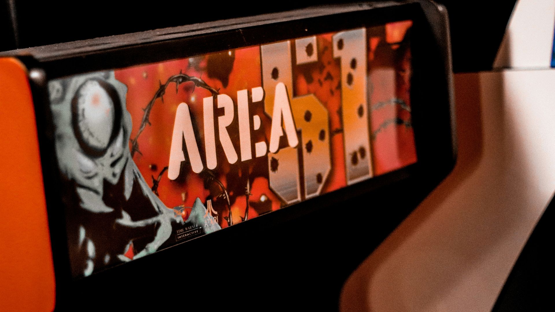 black flat screen tv turned on displaying man in black suit