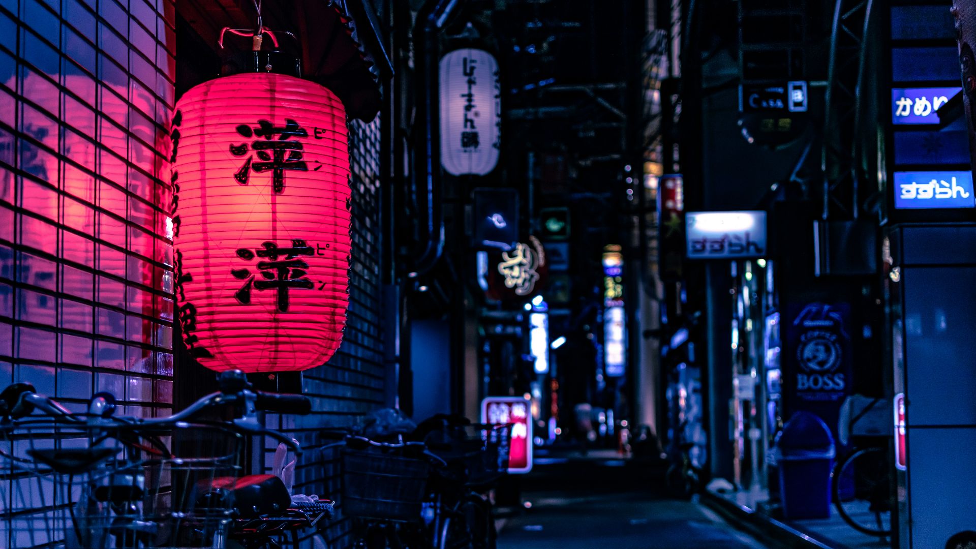 Japanese lantern over city bike at nighttime