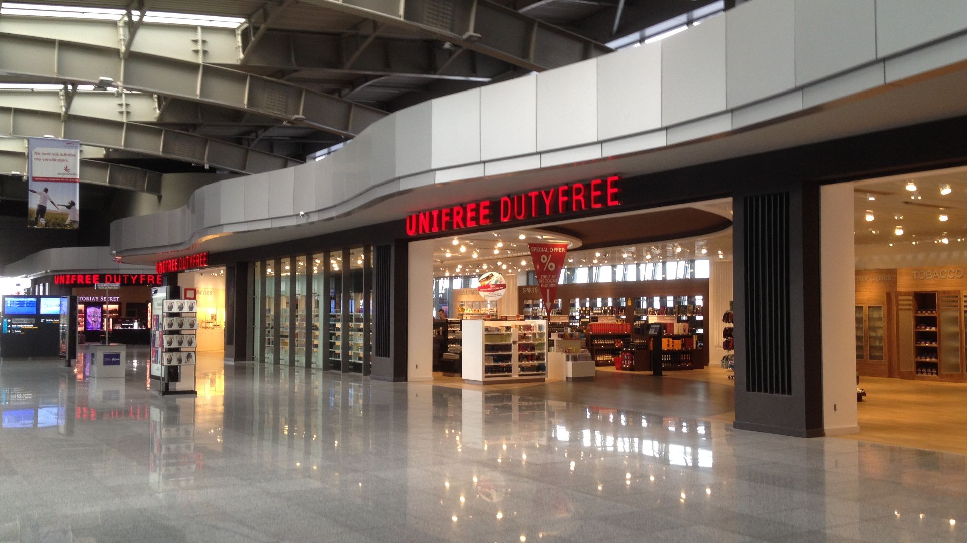 File:Pristina Airport Inside 2015 Duty Free Shop.JPG